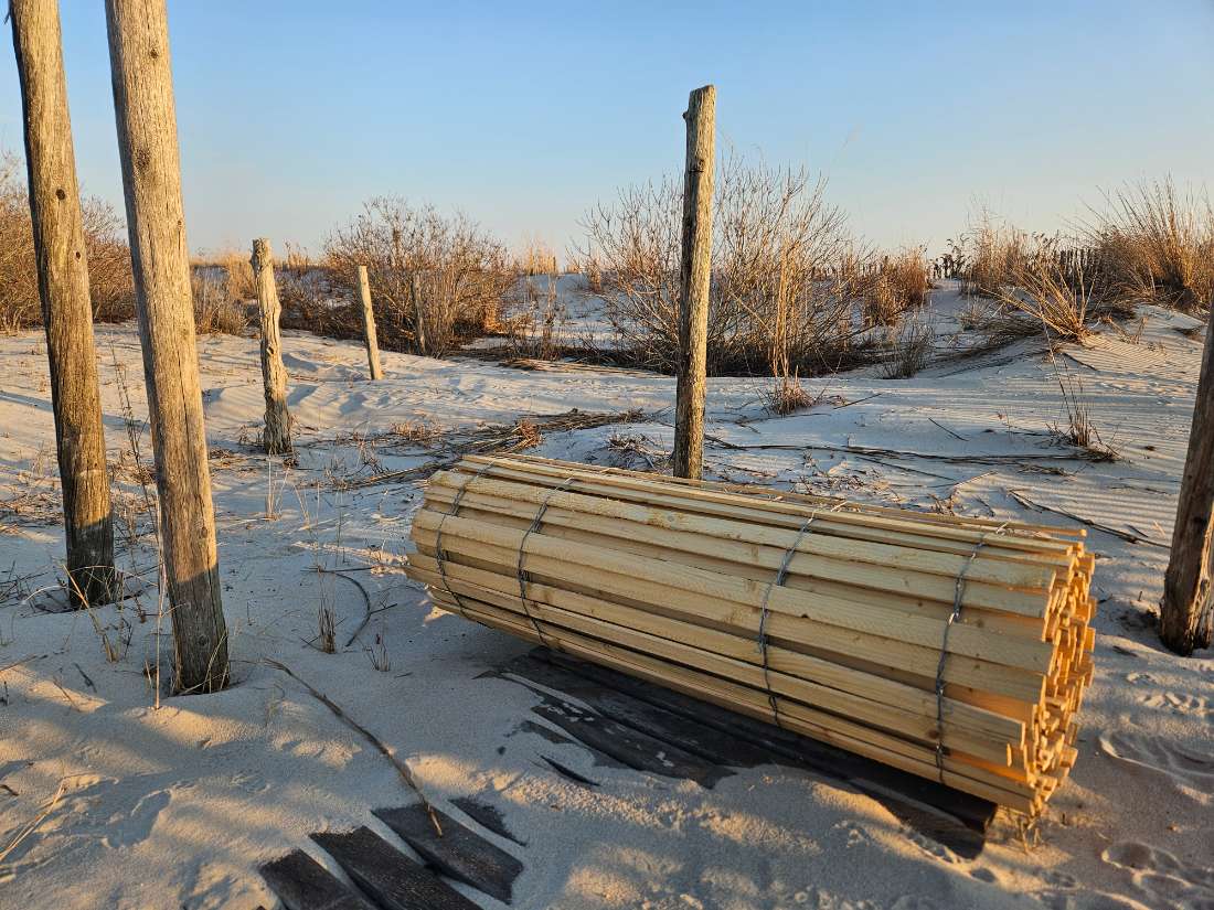 Rolled wood slat dune fence at a Jersey Shore Monmouth County Beach