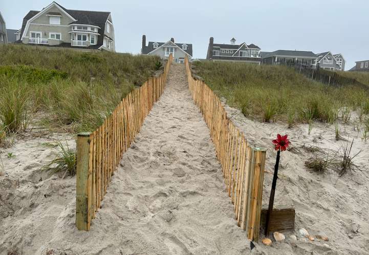 Sand fence at a private beach association access path in New Jersey